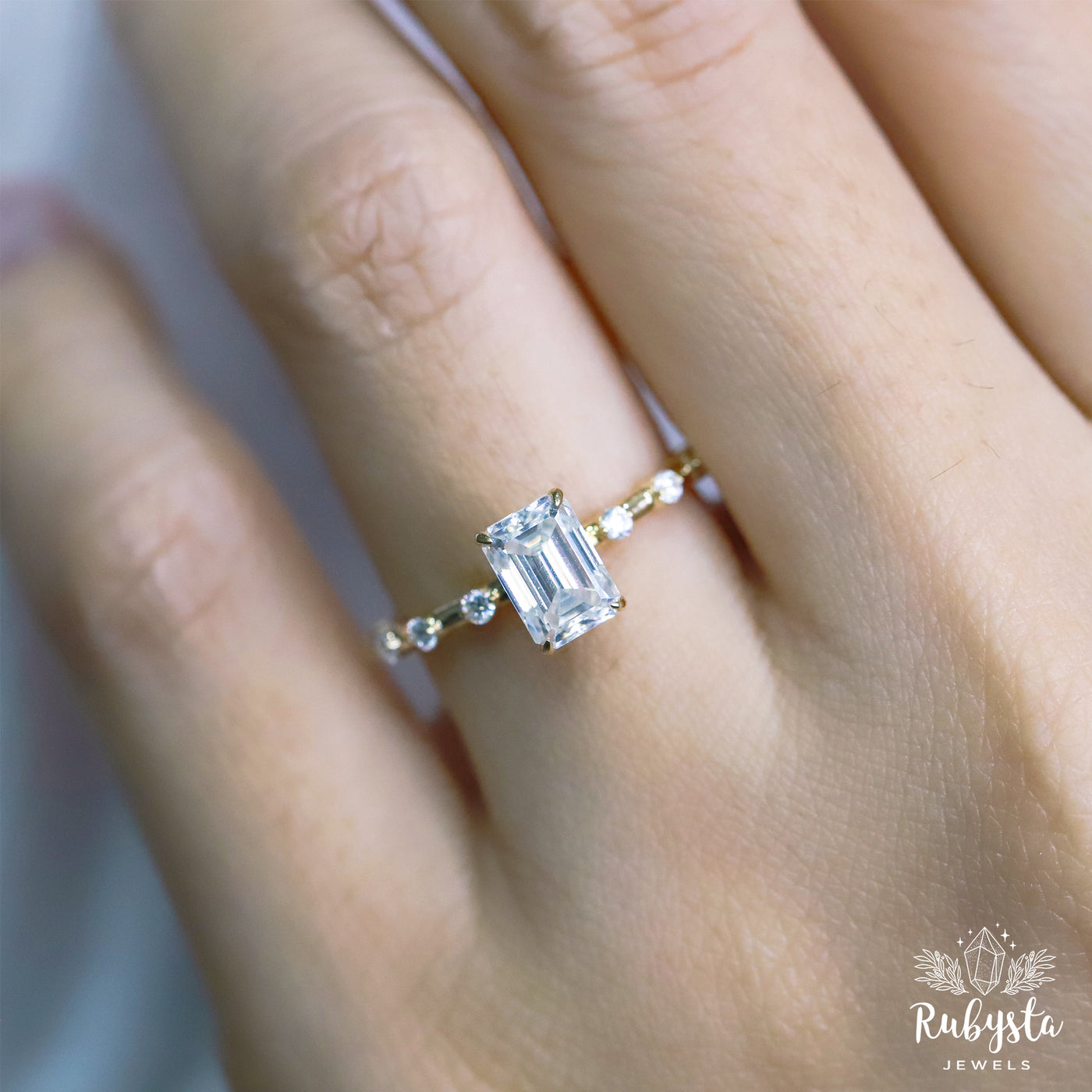 1.00ct Emerald Cut Moissanite Engagement Ring | Claw Prong Setting with Round Moissanite Accents