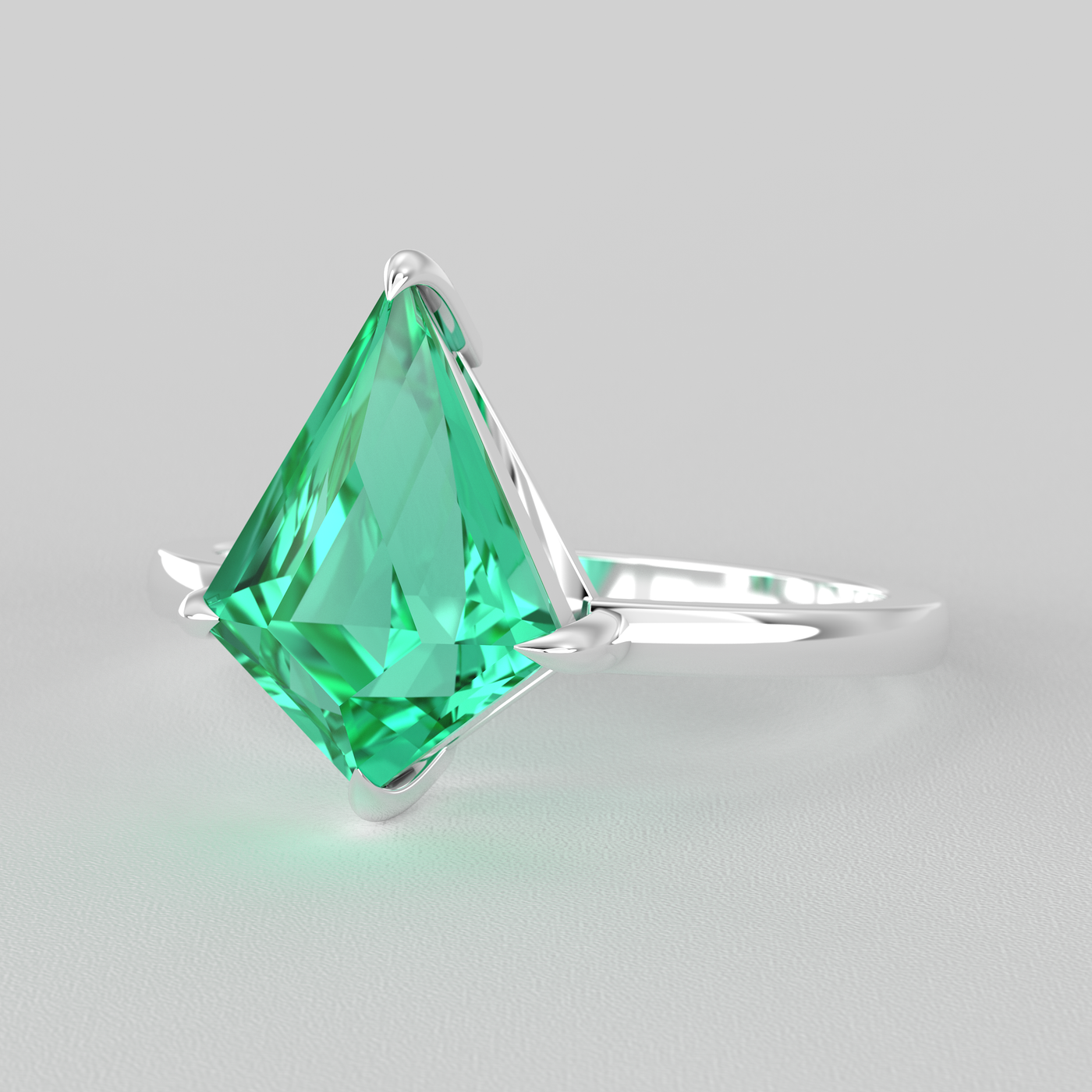 Bold Beauty: Green Emerald Kite Ring for Timeless Romance