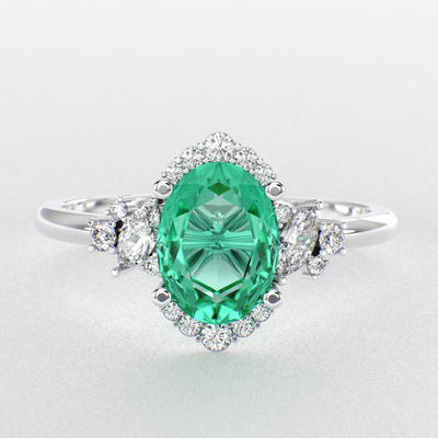 A Dazzling Trio: Green Oval Shape Emerald, Round, and Marquise Diamonds Setting New Trends