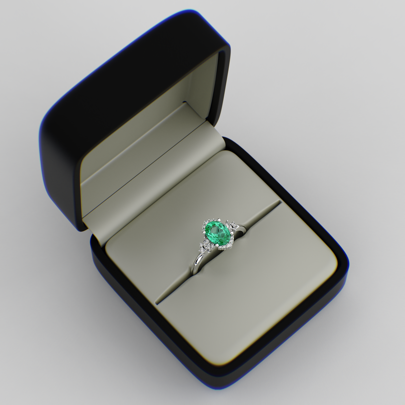 A Dazzling Trio: Green Oval Shape Emerald, Round, and Marquise Diamonds Setting New Trends