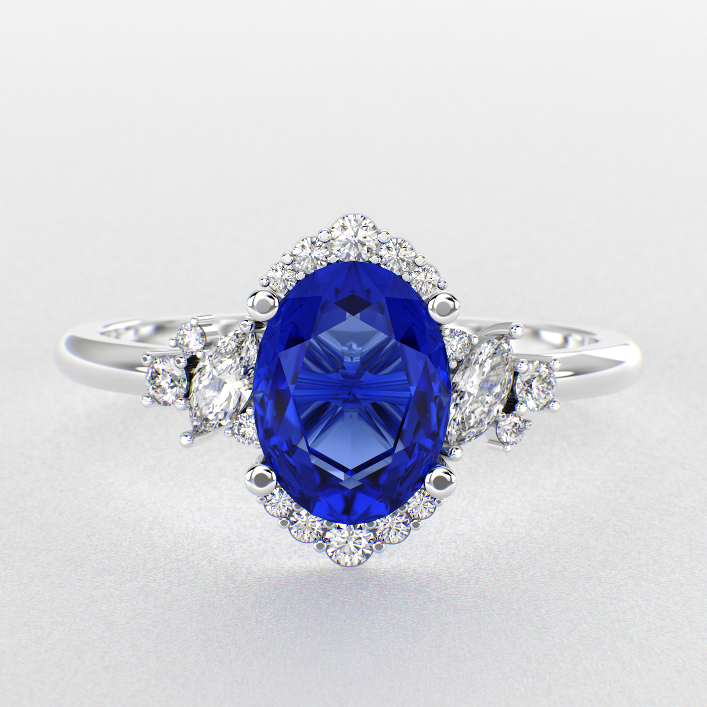 A Dazzling Trio: Blue Oval Shape Sapphire, Round, and Marquise Diamonds Setting New Trends