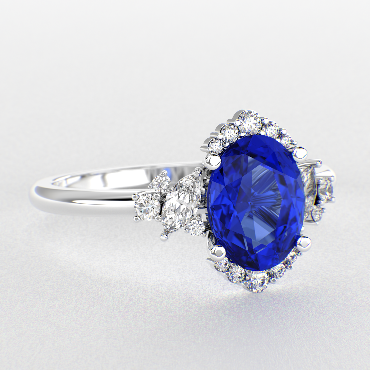 A Dazzling Trio: Blue Oval Shape Sapphire, Round, and Marquise Diamonds Setting New Trends