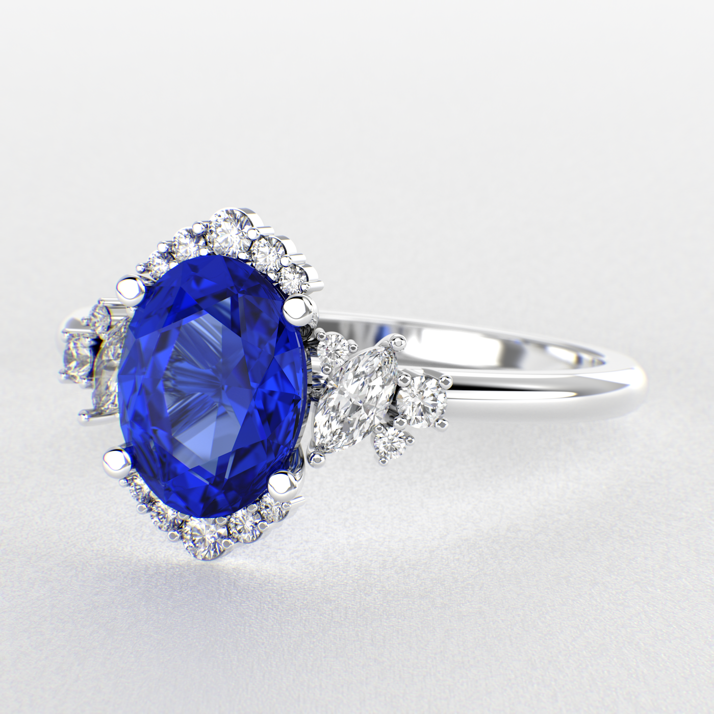 A Dazzling Trio: Blue Oval Shape Sapphire, Round, and Marquise Diamonds Setting New Trends