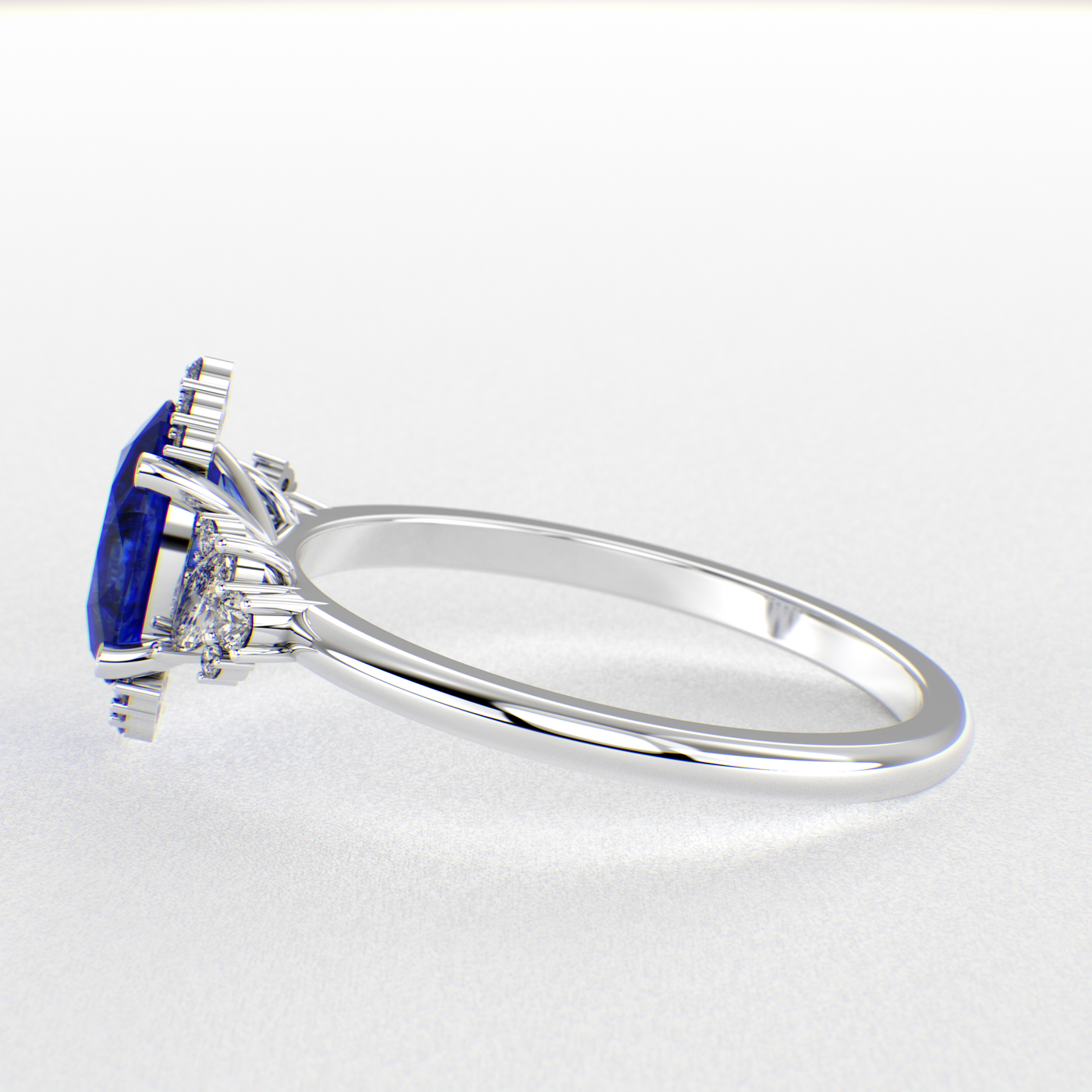 A Dazzling Trio: Blue Oval Shape Sapphire, Round, and Marquise Diamonds Setting New Trends