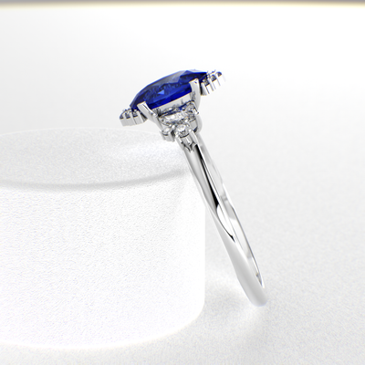 A Dazzling Trio: Blue Oval Shape Sapphire, Round, and Marquise Diamonds Setting New Trends