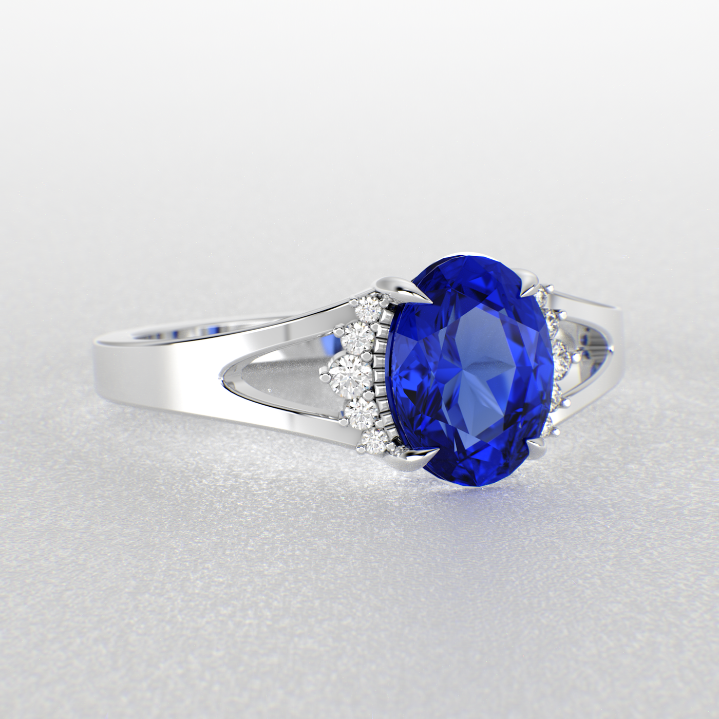 Gleaming Oval & Round Blue Sapphire Ring with Brilliant Sparkle