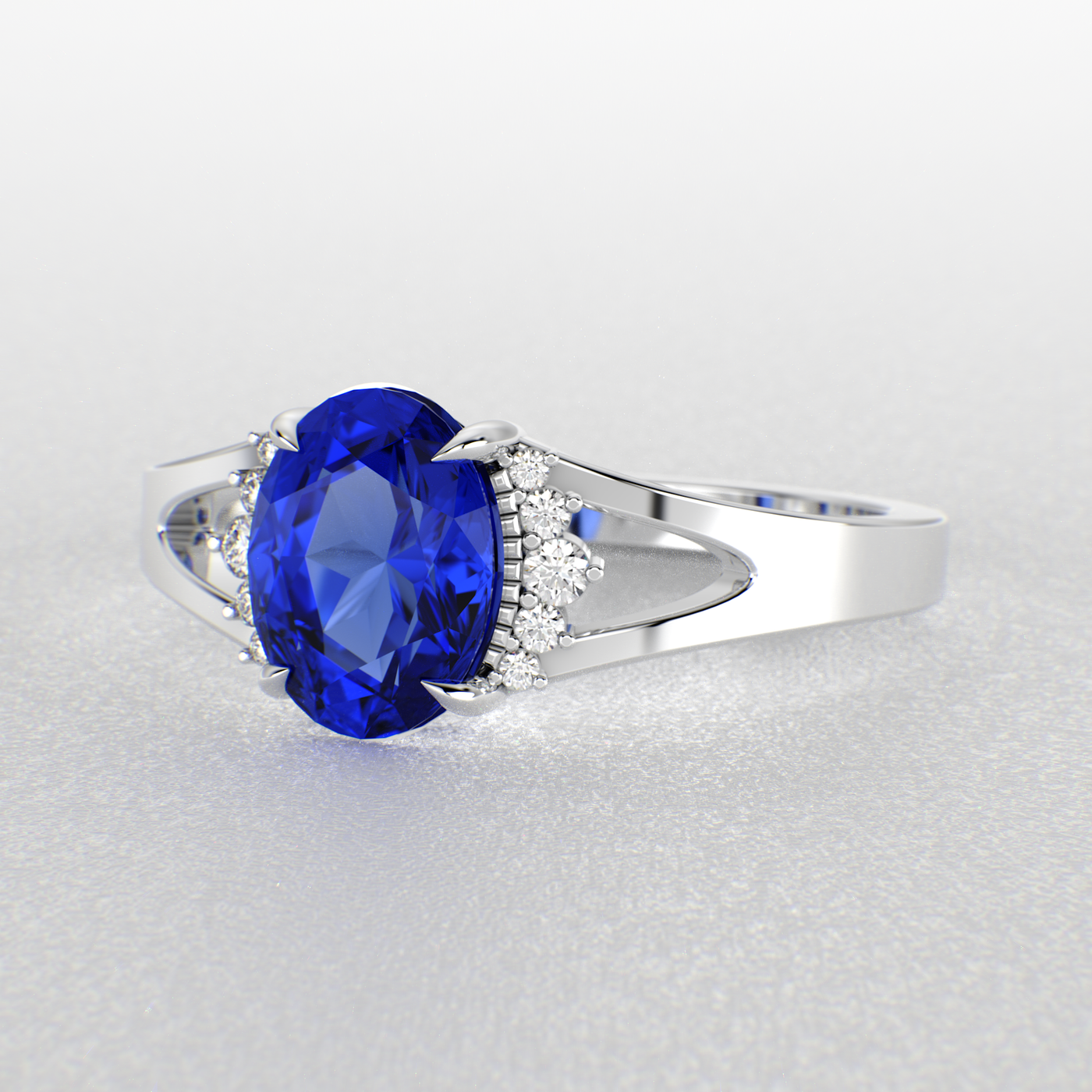 Gleaming Oval & Round Blue Sapphire Ring with Brilliant Sparkle