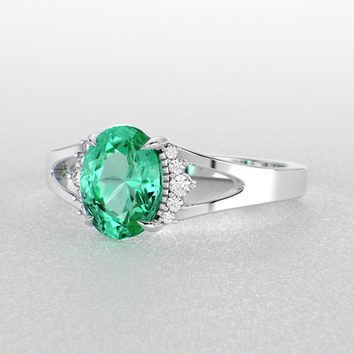 Gleaming Oval & Round Green Emerald Ring with Brilliant Sparkle