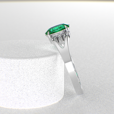 Gleaming Oval & Round Green Emerald Ring with Brilliant Sparkle