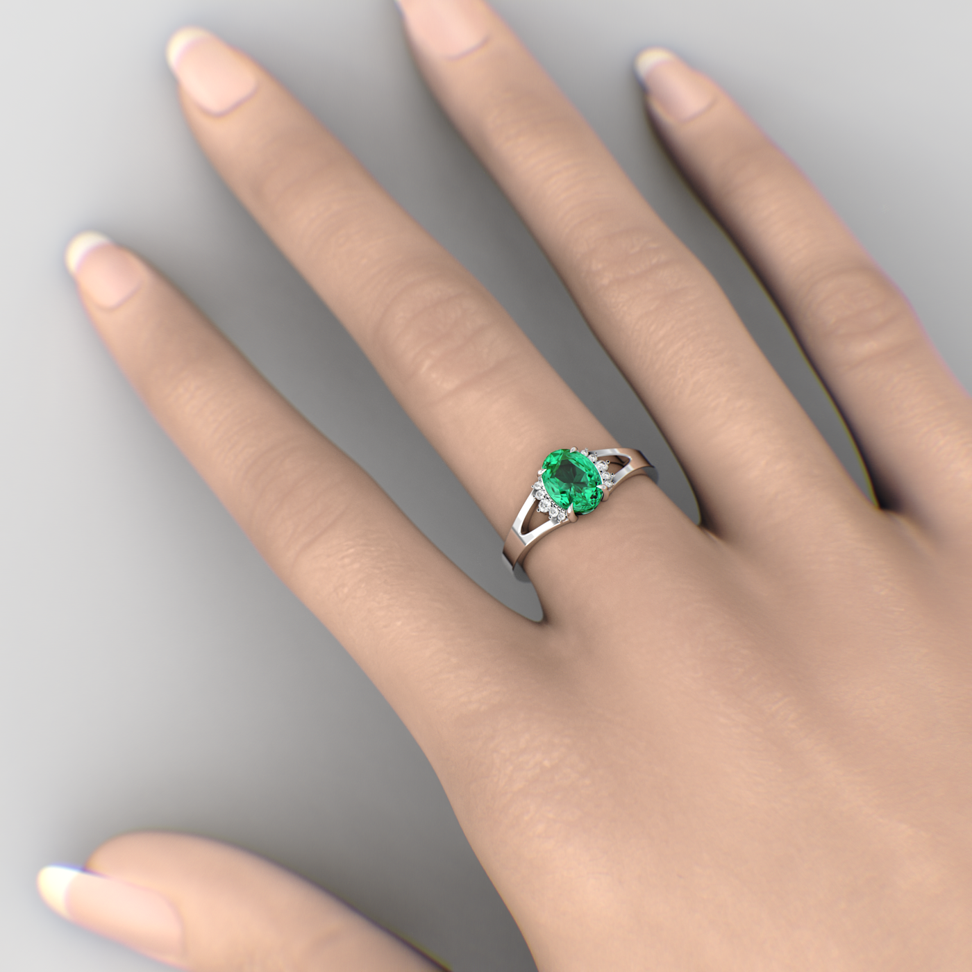 Gleaming Oval & Round Green Emerald Ring with Brilliant Sparkle