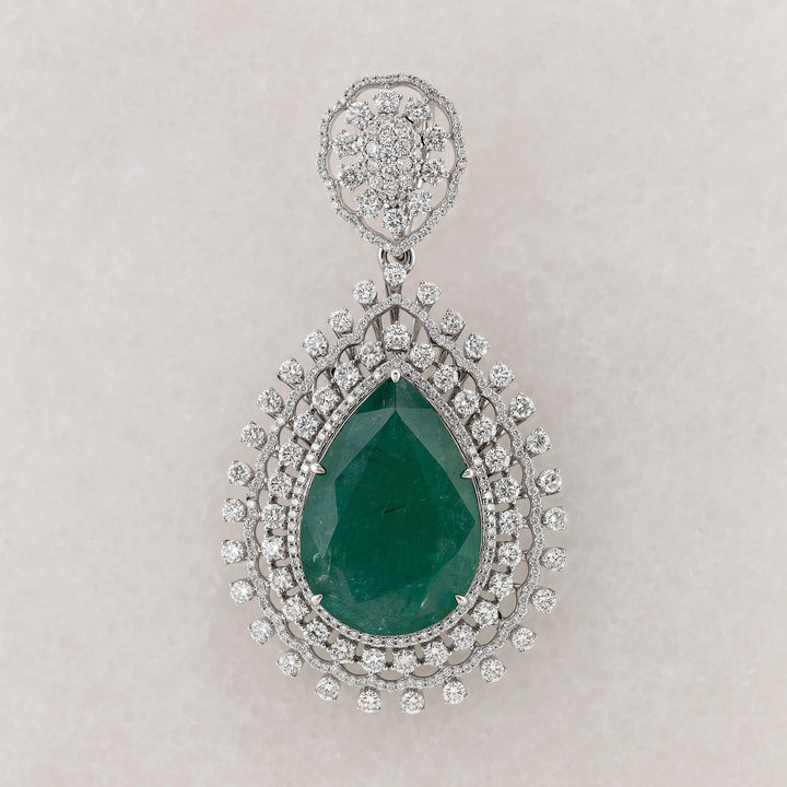 Green emerald color pear shaped pendant with white diamond halo setting - Rubysta