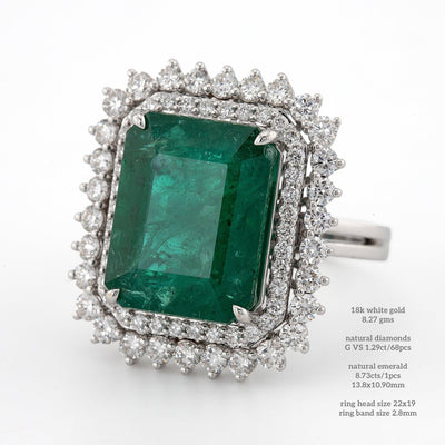 Emerald shaped green emerald color with white diamond halo setting engagement ring - Rubysta