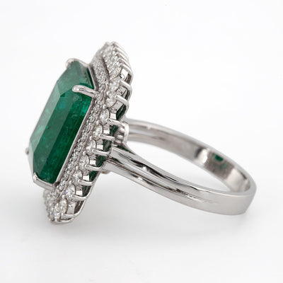 Emerald shaped green emerald color with white diamond halo setting engagement ring - Rubysta