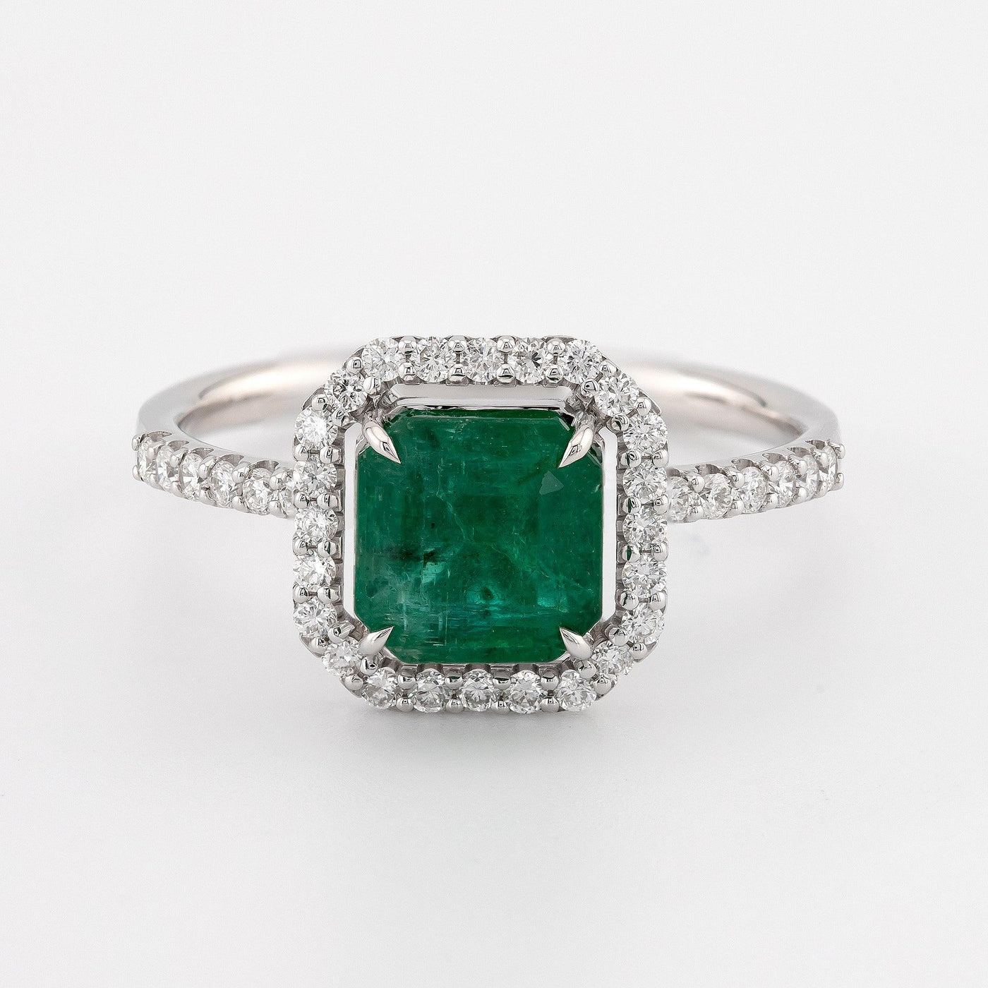 Stunning asscher cut green emerald color diamond with straight shank, eagle claw prongs, halo setting engagement ring - Rubysta