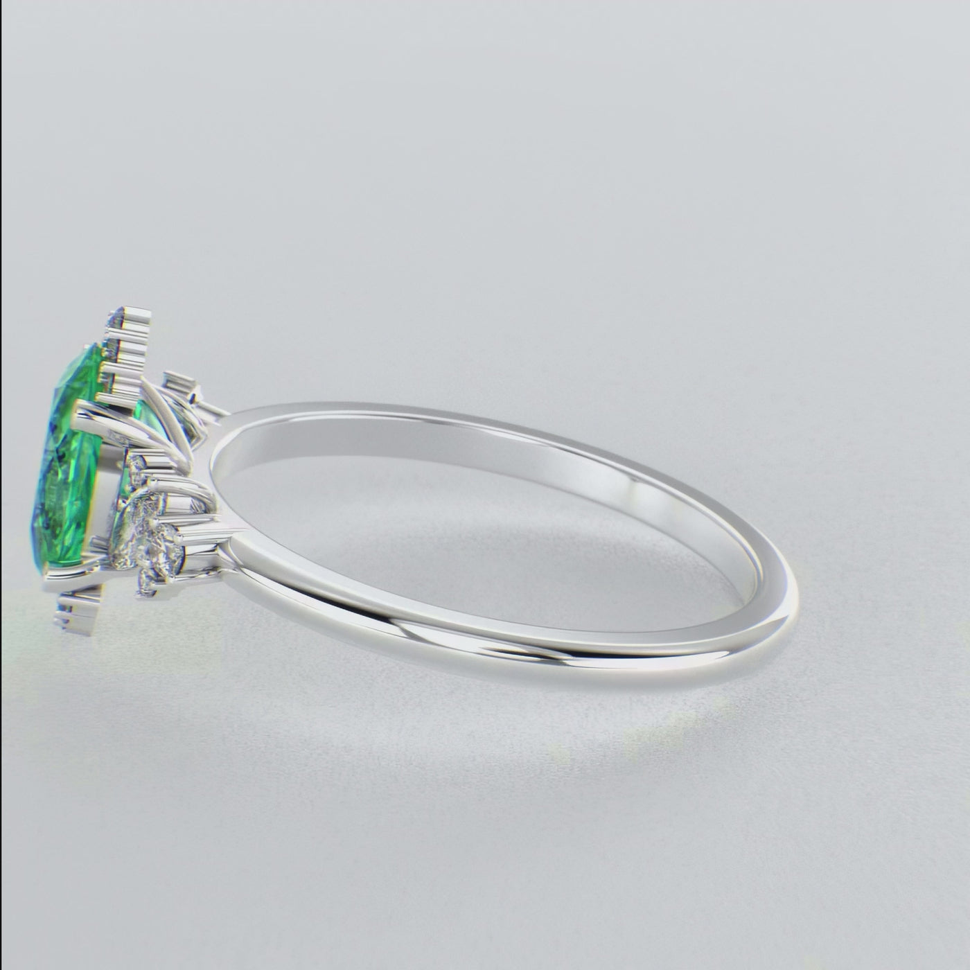 A Dazzling Trio: Green Oval Shape Emerald, Round, and Marquise Diamonds Setting New Trends