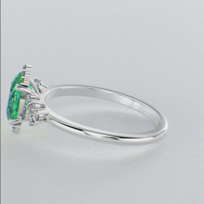 A Dazzling Trio: Green Oval Shape Emerald, Round, and Marquise Diamonds Setting New Trends