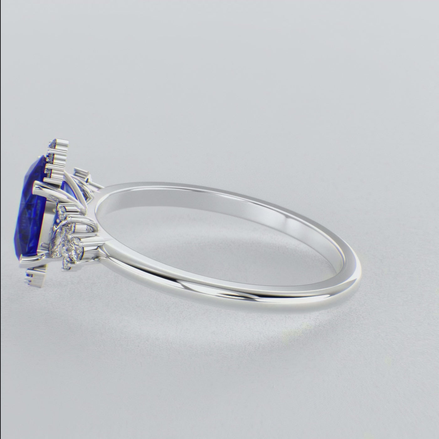 A Dazzling Trio: Blue Oval Shape Sapphire, Round, and Marquise Diamonds Setting New Trends