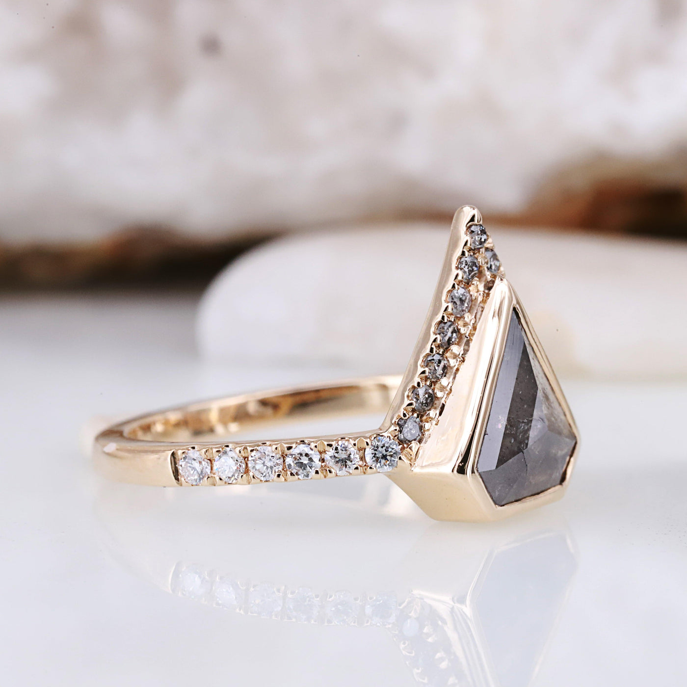 Make a bold statement with our geometric salt and pepper engagement ring. Unique, modern, and absolutely stunning